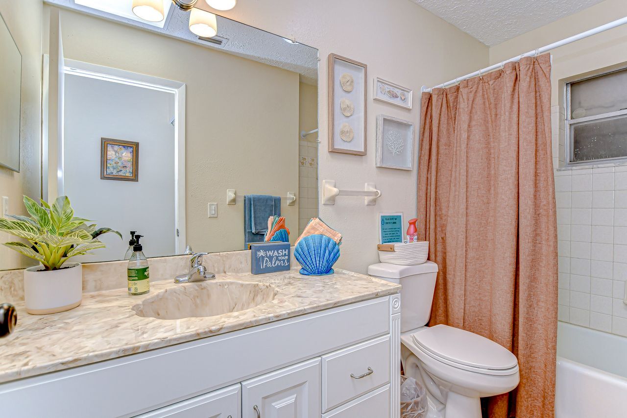 The bathroom has a shower/tub combo - 5114 33rd St E