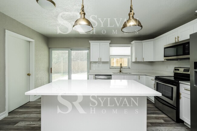 Building Photo - You Can Afford to Dwell Well.