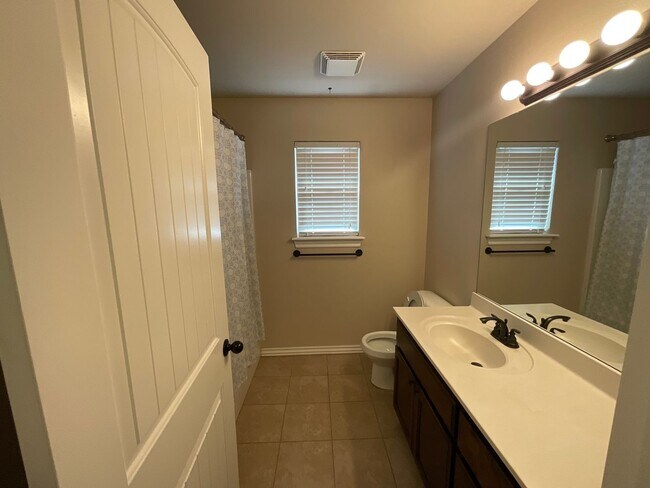 Building Photo - 4 bed, 2 bath, 2 car garage, 12-14 person Storm Shelter