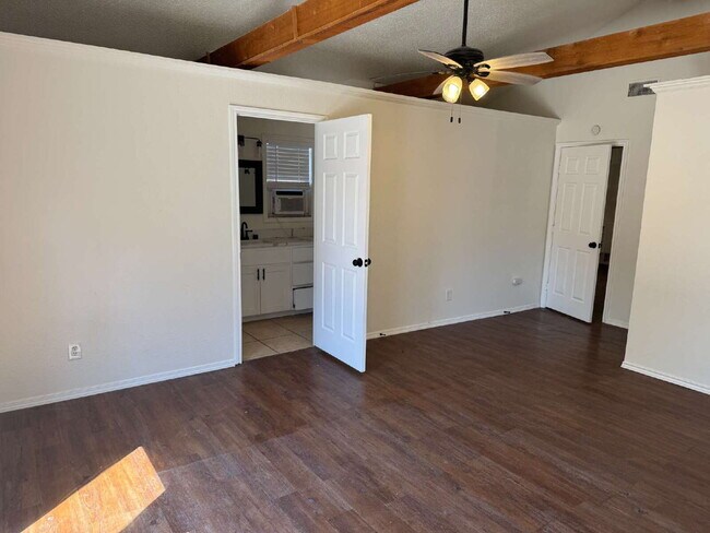 Building Photo - "Charming 4-Bed Lubbock Retreat: Granite Kitchen, Hardwood Elegance & Cozy Fireplace!"