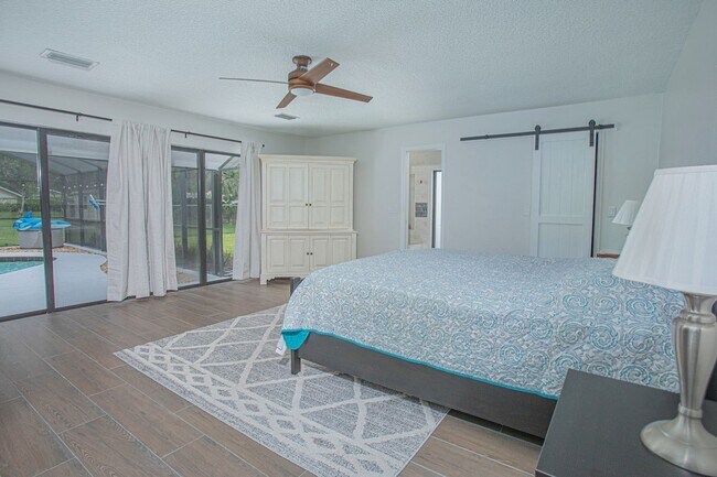 Building Photo - Beautifully Updated 3/2 Pool Home with Lar...