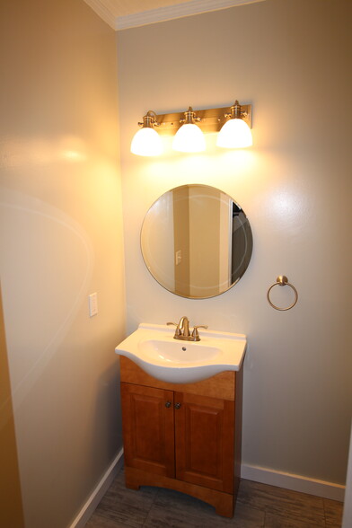 Convenient and updated half-bath on the first floor - 4536 Leo Street