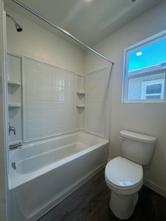 Building Photo - BRAND NEW 4 BEDROOM, 2.5 BATHS, 2 CAR GARA...