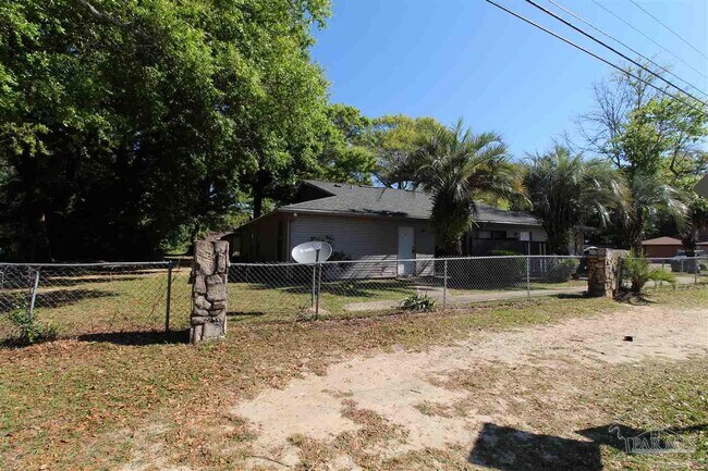 Building Photo - 6801 Tiki Ln