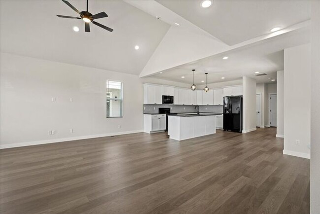 Building Photo - Brand New, Stylish 4-Bedroom Home with Vau...