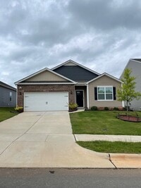 Building Photo - Spacious & Modern Ranch-Style Living