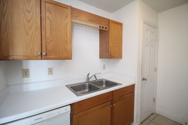 Building Photo - Spacious Vinyl-Sided 2BR Apartment with Open Layout, Private Patio, and Pet-Friendly Options – Av...