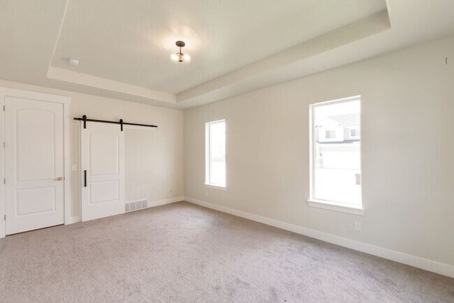 Building Photo - SPECTACULAR VIRTUALLY NEW HOME IN SOUGHT A...