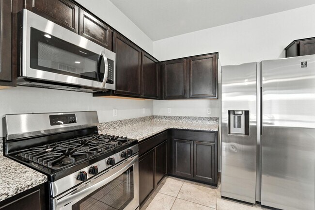 Building Photo - Rare Find! Spacious 3-Bed, 2-Bath + 3-Car ...