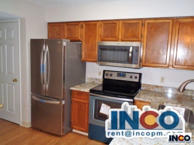 Building Photo - Light &amp; Bright 2 bed 1 bath Condo near...