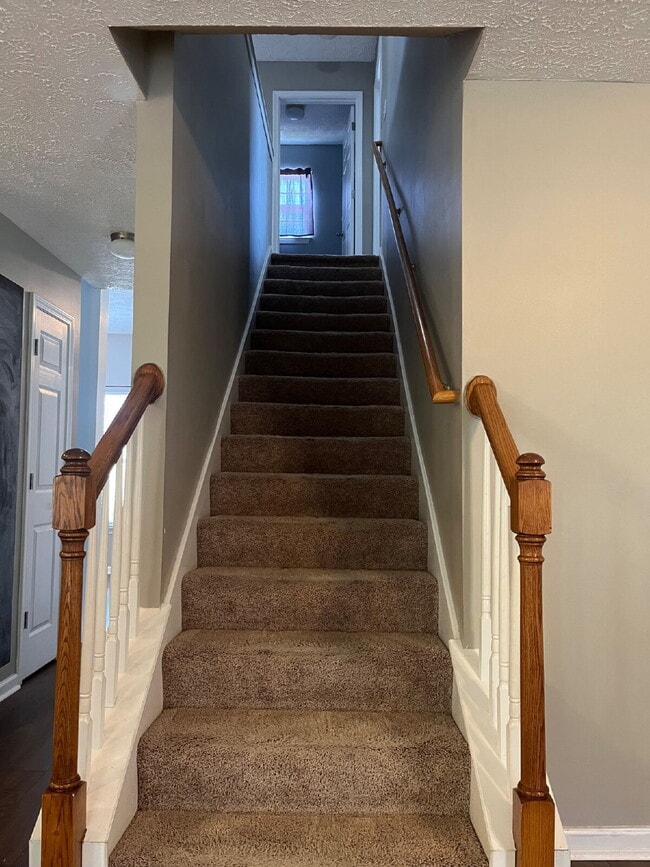 Building Photo - "Spacious 3-Bedroom Townhouse Retreat with Fireplace & Hardwood Floors in Antioch!"