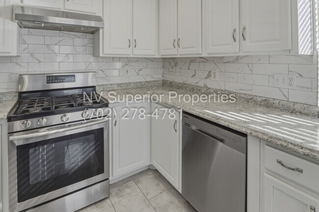 Building Photo - SE!!! 4 Bedrooms!! Master Downstairs!! No Carpet!! Synthetic Grass front and back!!