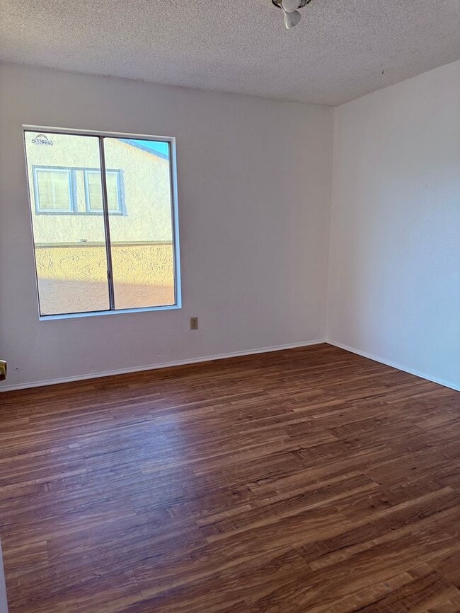 Building Photo - Long term Condo