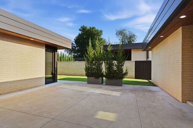 Building Photo - Experience contemporary luxury in this exceptional custom-built Midtown Tulsa residence, where so...