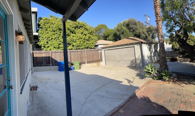 Back yard: Looking East from Kitchen door - 1120 Pacific St