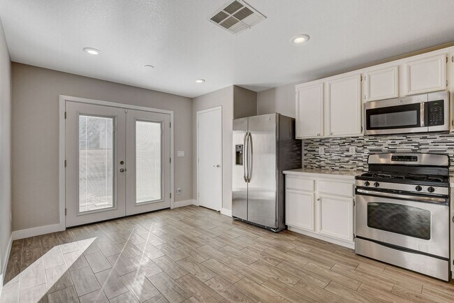 Building Photo - Totally Updated Solar Powered 4 Bedroom! Bedroom and Bath Downstairs!