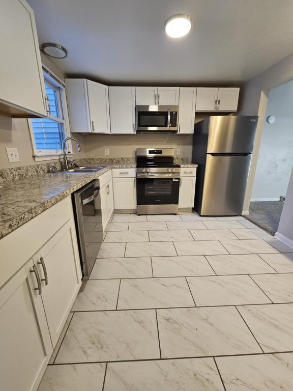 Building Photo - 8170 Honeysuckle Dr