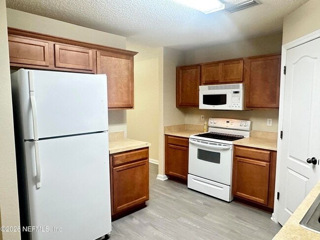 Building Photo - 7775 Playschool Ln