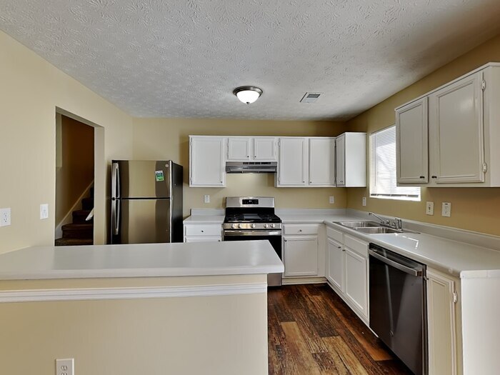 Building Photo - 6365 Peppermill Ln