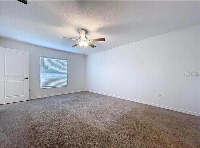 Building Photo - 6557 Bar S Bar Trl