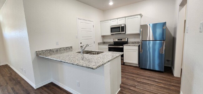 Building Photo - Act fast!  Don't let this opportunity slip by. Contact us today to schedule your showing!