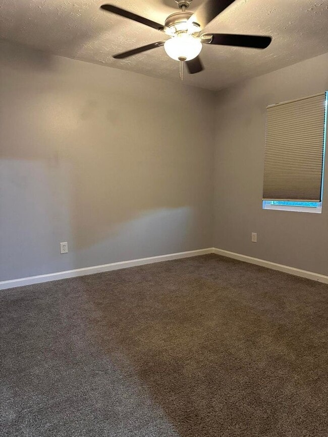 Building Photo - Move-In Ready Corner-Lot Home with Wraparound Porch Near Fort Eisenhower