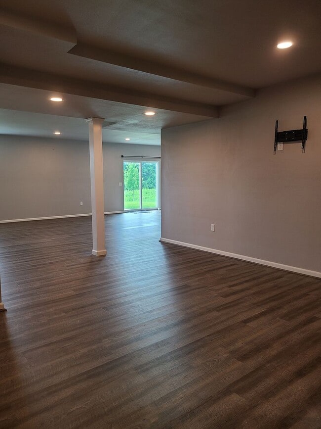 Building Photo - Four Bedroom Three Bath Single Family Home