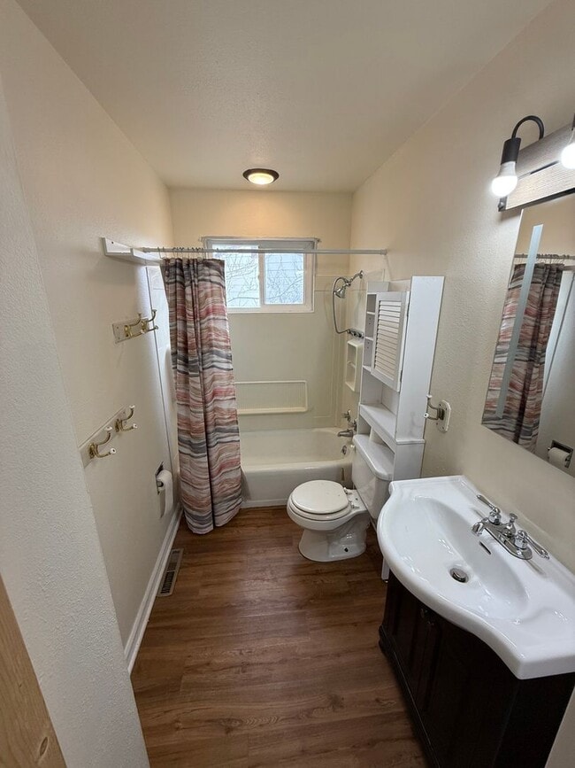 Building Photo - 4 Bedroom 2 Bathroom Home on Large Corner Lot with 2 Car Attached Garage In Great Neighborhood In...