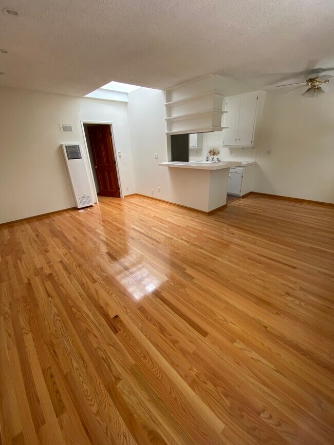 Living room with skylight - 1739 Washington Way