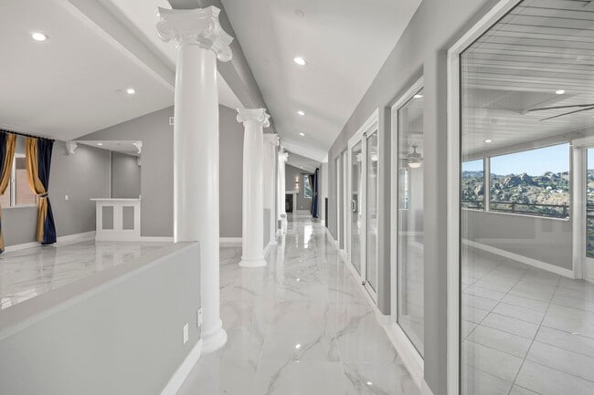 Building Photo - Modern Elegance Meets Scenic Privacy in Be...