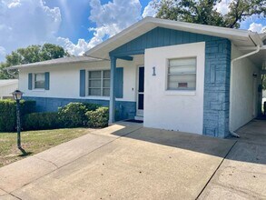 Building Photo - 2 bedroom, 1.5 bath home with carport
