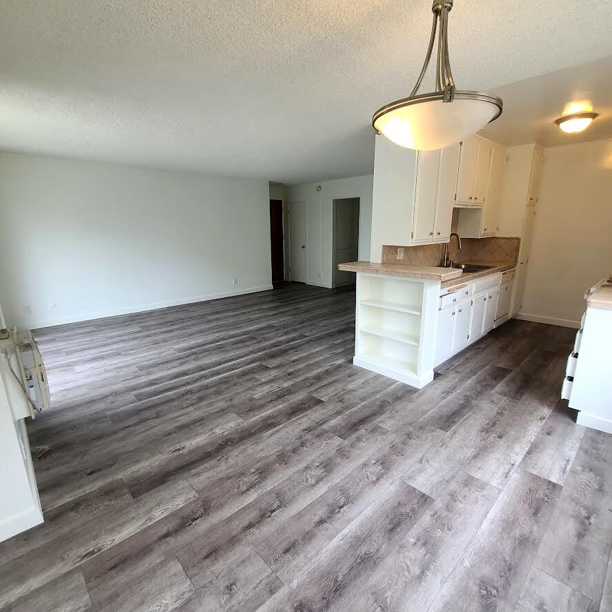 living room, dining area and kitchen - 5555 W 8th St