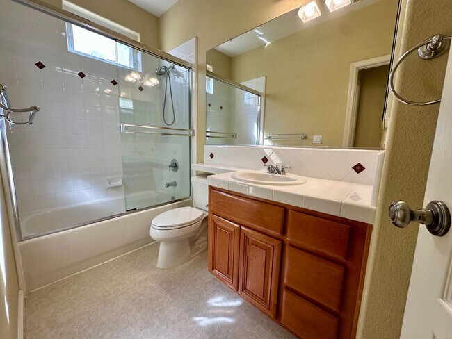 Building Photo - TOWNHOME WITH THOUGHTFUL UPGRADES | CALM SETTING