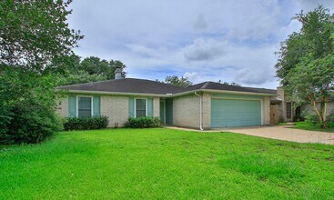 Building Photo - 4 Bedroom 2 Bathroom Cypress Home with Fireplace and Fenced Backyard