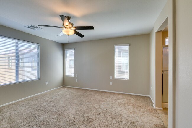 Building Photo - Spacious Townhouse with Loft & Rare 3-Car Garage!