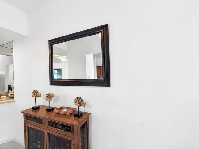 Building Photo - Beautifully furnished 2BR/2BA first-floor condo