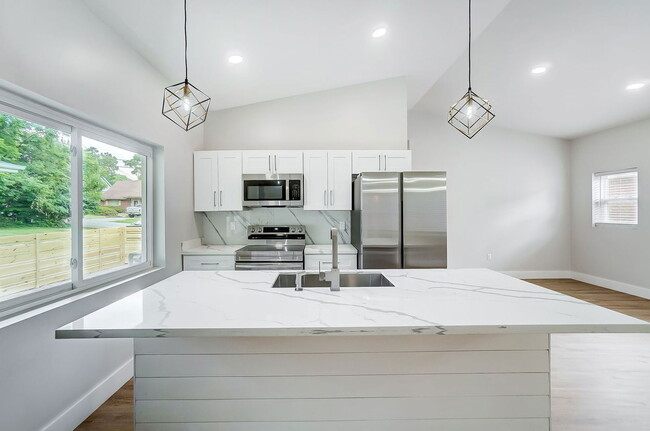 Building Photo - 3719 Kirkup Ave