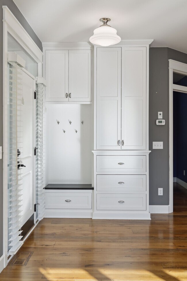 9' tall custom hand made cabinetry with antique hardware. - 924 Eleanor Ave