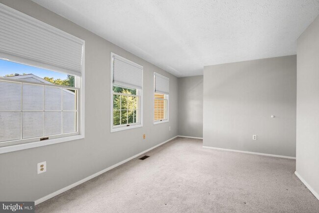 Building Photo - 7807 Breezy Down Terrace