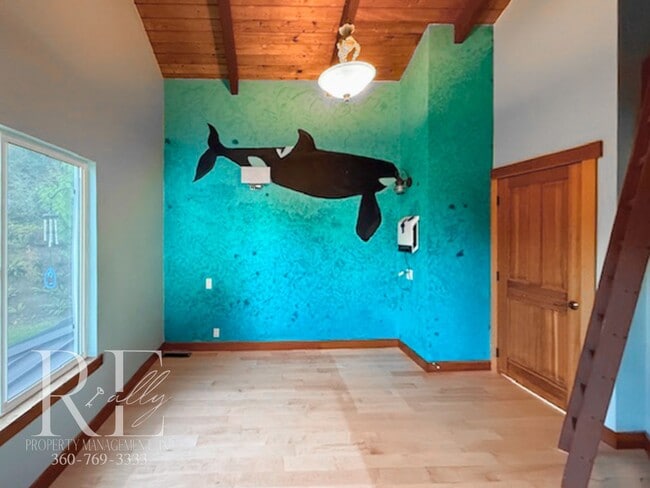 Building Photo - Waterfront Rustic Retreat with Vaulted Ceilings, Picture Windows & Lofted Nook