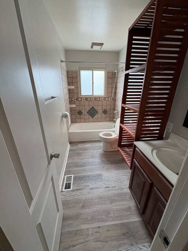 Building Photo - Beautiful updated home with new flooring and fresh paint