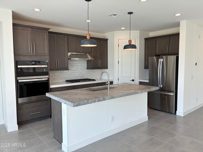 Building Photo - 10862 N Brownsville Ln