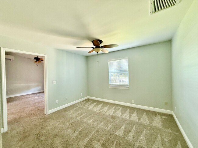 Building Photo - Palm City Home with Dock and Lift