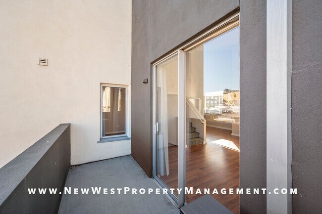Building Photo - Views, Views, Views! Stunning Top-Floor Little Italy 2-bedroom Loft at The Waterfront!