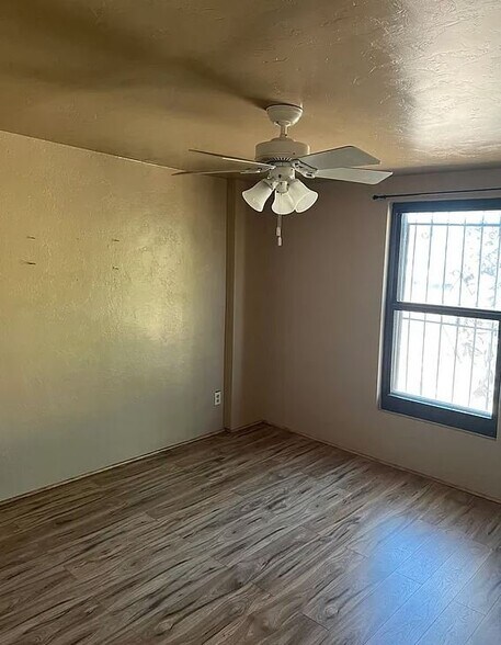 Building Photo - 6027 S Lostan Ave
