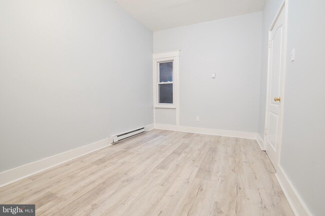 Building Photo - 7022 Woodland Ave