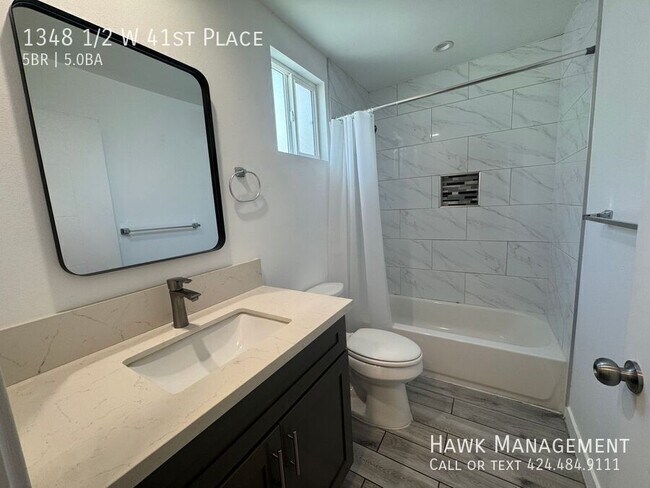 Building Photo - 1348 1/2 W 41st Place-