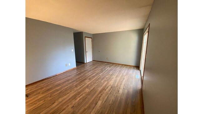 Building Photo - Spacious 3 - Bedroom Townhome with Modern Updates & Private Green Space.