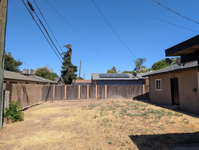 Building Photo - Updated home featuring a nice floor plan a...