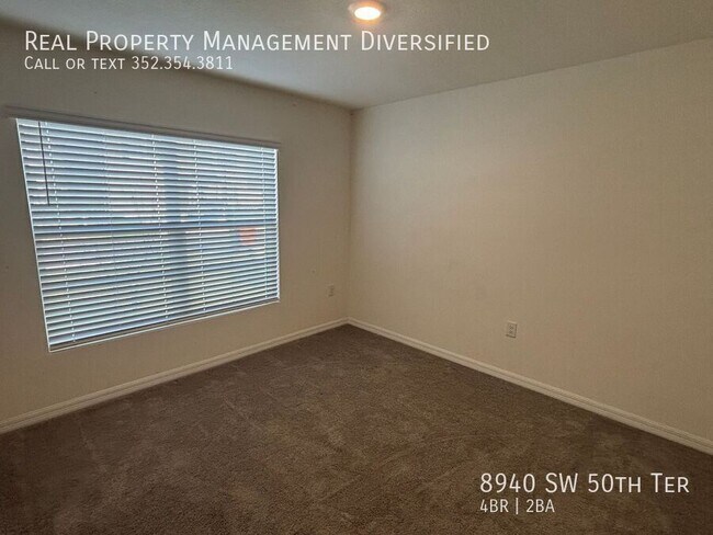 Building Photo - 8940 SW 50th Ter